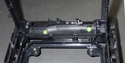 Screws securing the chassis members together